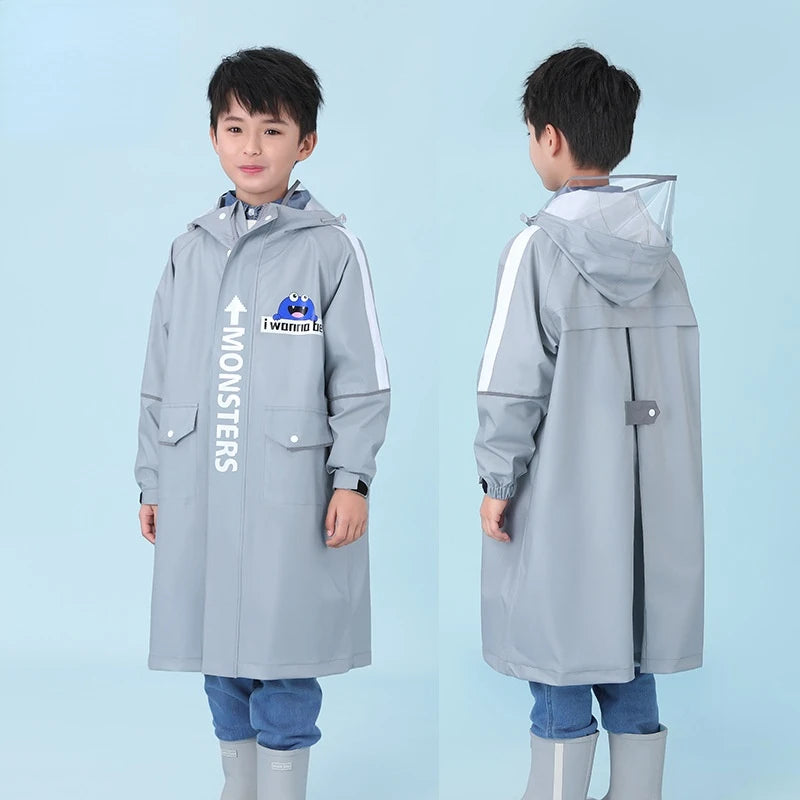 Full body waterproof skin friendly thickened fabric children's raincoat with schoolbag for middle and primary school students